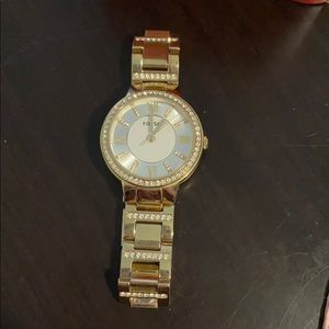 Gold fossil watch